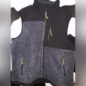 Brand new men’s size xlarge Sherpa vest.